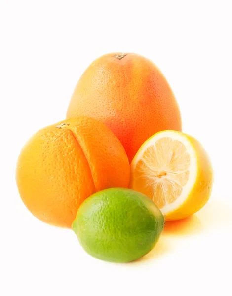 Ripe citrus fruits over white — Stock Photo, Image