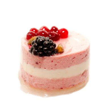 Yogurt cranberries cake with berries isolated on white