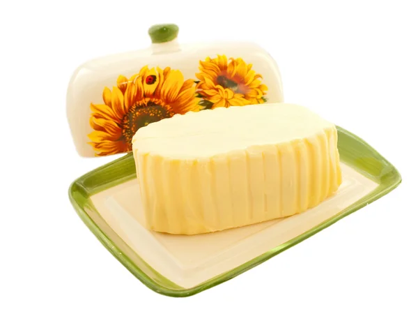 Butter on white butterdish over white — Stock Photo, Image