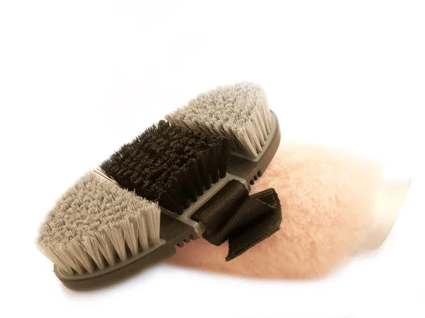 Soft brush for grooming horses and sheepskin pink mitten for gr — Stock Photo, Image