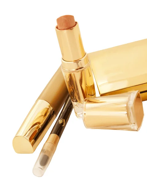 Gold Make-up Kollektion isoliert auf schwarzem Hintergrund — Stockfoto