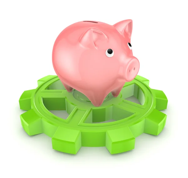 Pink piggy bank on a green gear. — Stock Photo, Image