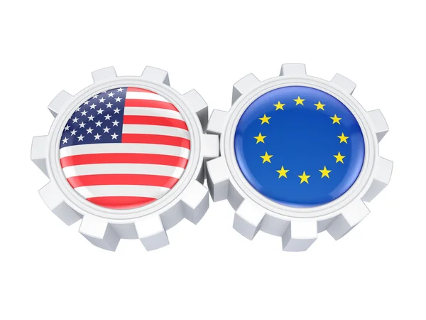Europese Unie en Amerikaanse vlaggen op een gears. — Stockfoto