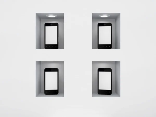 Telefones celulares modernos em uma vitrine . — Fotografia de Stock