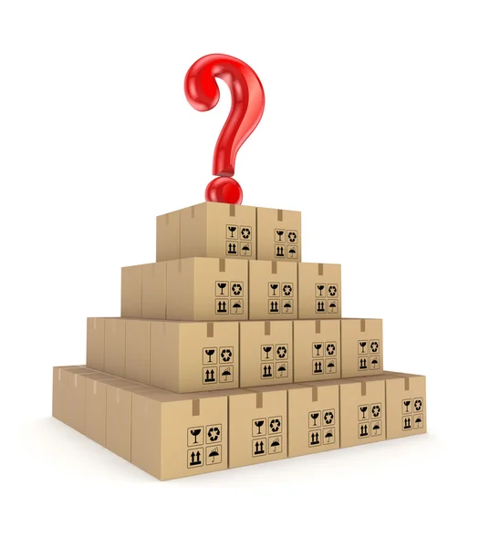 Red query mark on a pyramid made of carton boxes. — Stock Photo, Image