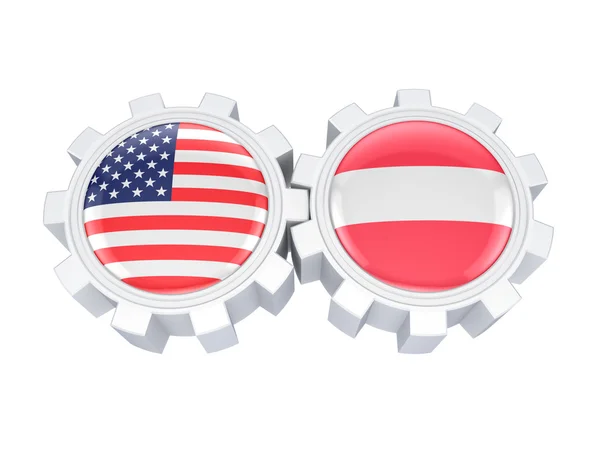 American and austrian flags on a gears. — Stock Photo, Image