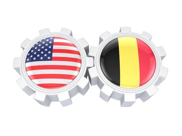 Amerikanische und belgische Flaggen auf einem Getriebe. — Stockfoto