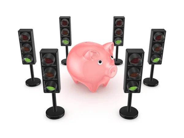 Verkeerslichten rond roze piggy bank. — Stockfoto