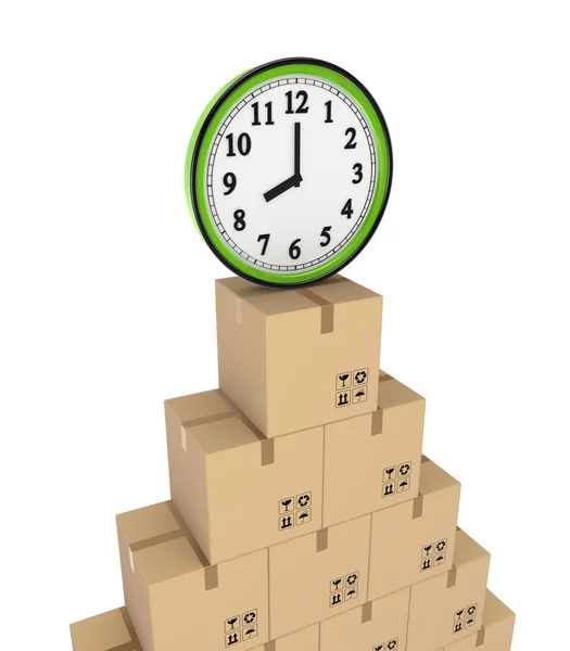 Cajas de cartón y reloj verde . —  Fotos de Stock