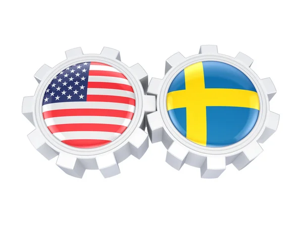 American and swedish flags on a gears. — Stock Photo, Image