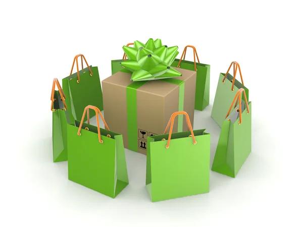 Groene pakketten rond grote kartonnen doos. — Stockfoto