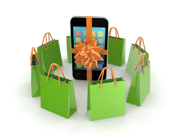 Groene pakketten rond mobiele telefoon. — Stockfoto