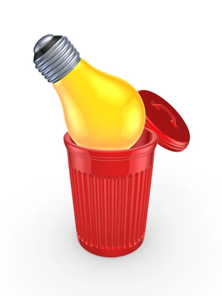 Жовта лампа в кошику для переробки . — стокове фото