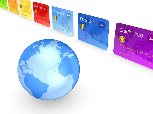 Glob i kolorowe karty kredytowe. — Zdjęcie stockowe