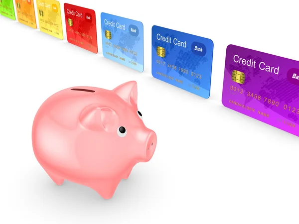 Pink piggy bank and colorful credit cards. — Stock Photo, Image