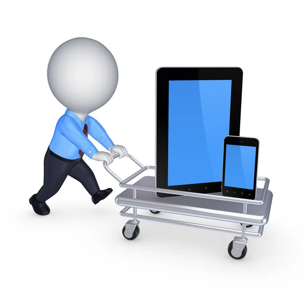 Tablet pc en mobiele telefoon op pushcart. — Stockfoto