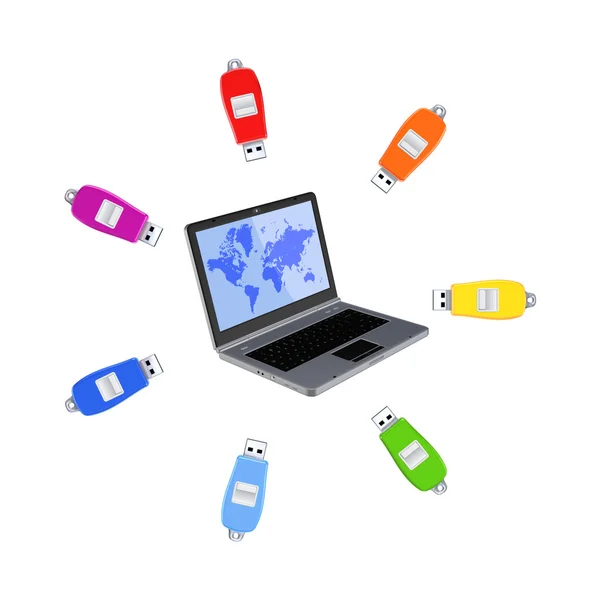 Colorful flashdrives around notebook. — Stock Photo, Image