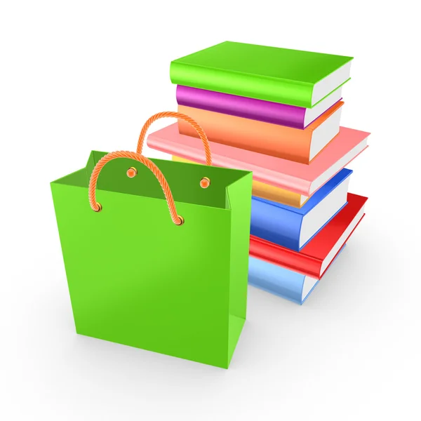 Stapel van kleurrijke boeken en groene packet. — Stockfoto