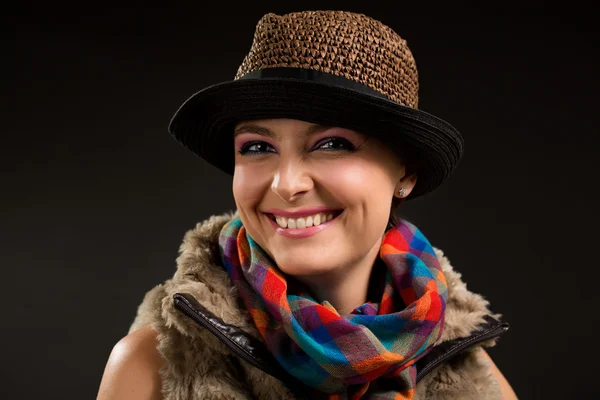 Portrait of the girl in a hat and a scarf — Stock Photo, Image