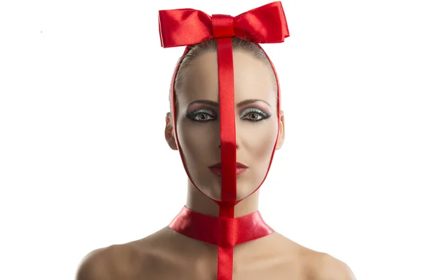 Beauty portrait of girl with red bow, she is in front of the cam — Stock Photo, Image