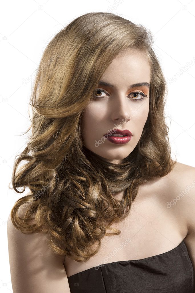 portrait of girl with wavy hair and sensual expression