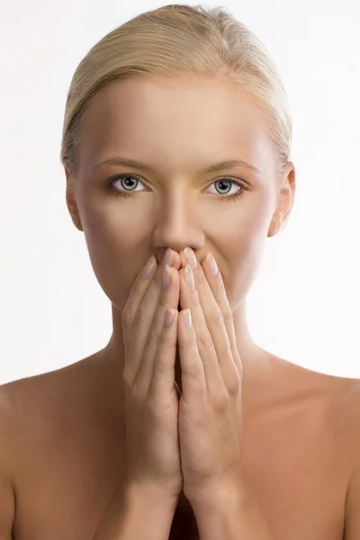 Portrait of blonde girl with colored make-up and hands on the mo — Stock Photo, Image