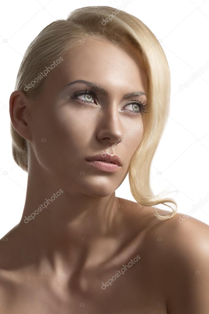beauty portrait of blonde girl looks at left
