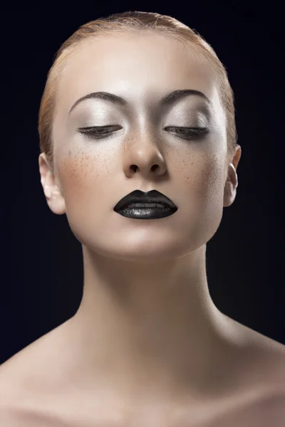 Blonde girl with dark lipstick looks down — Stock Photo, Image