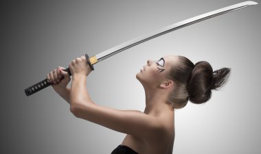brunette in japan style with katana taked with both hands clipart