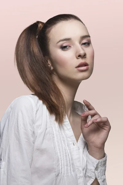 Beauty lady with smooth ponytail — Stock Photo, Image