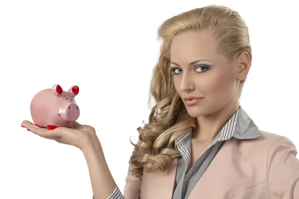 Mulher loira com piggybank — Fotografia de Stock