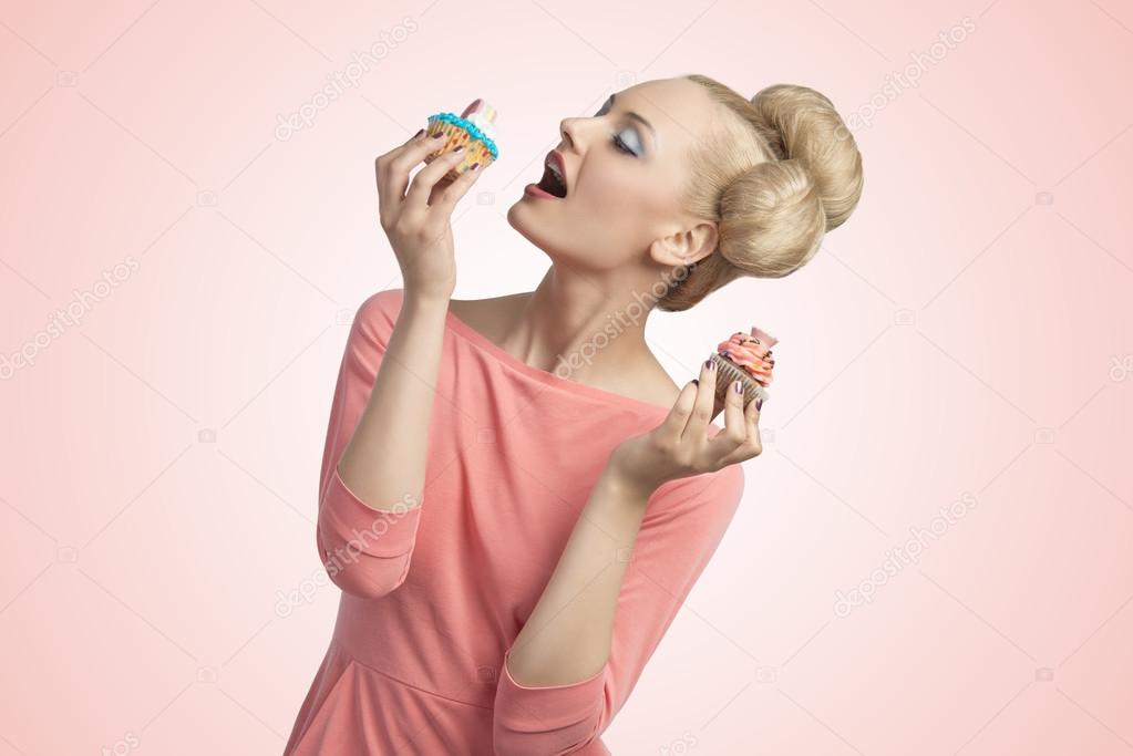 greedy woman with cupcakes