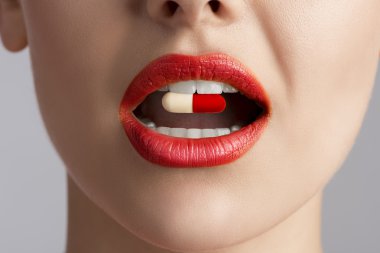 beauty female lips with pill clipart