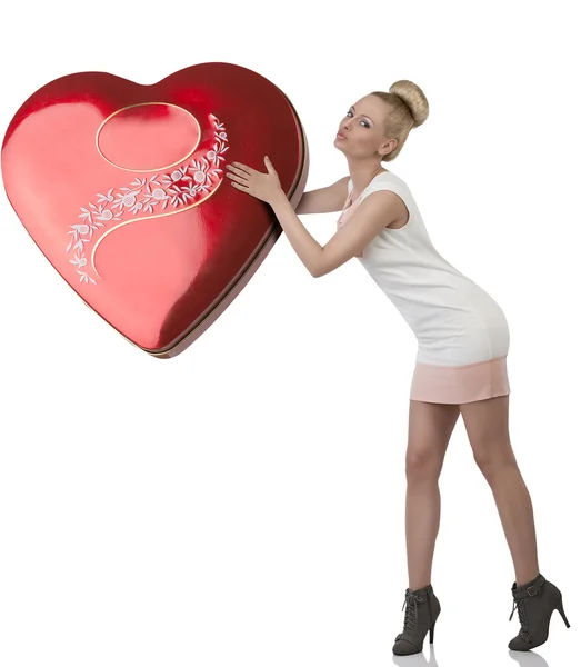 Blonde female kissing big gift — Stock Photo, Image