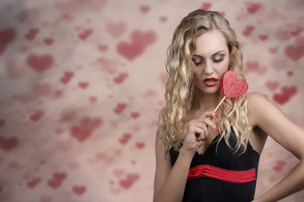 Sensual girl with lollipop — Stock Photo, Image