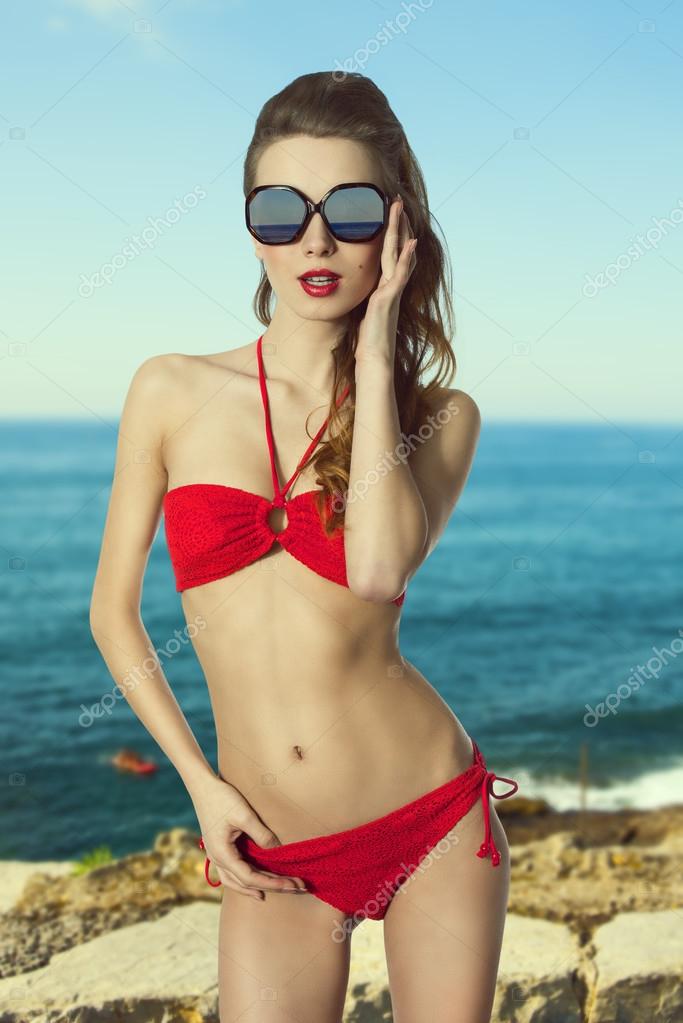 Bikini girl with sunglasses — Stock Photo © carlodapino 45696249