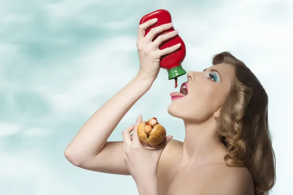 Sensual girl with ketchup — Stock Photo, Image