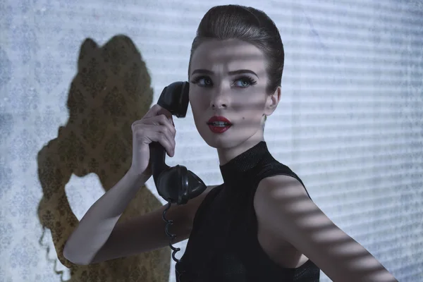 Girl with vintage telephone — Stock Photo, Image