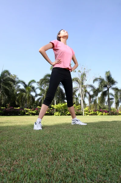 Pretty woman breathing in a park Stock Photo