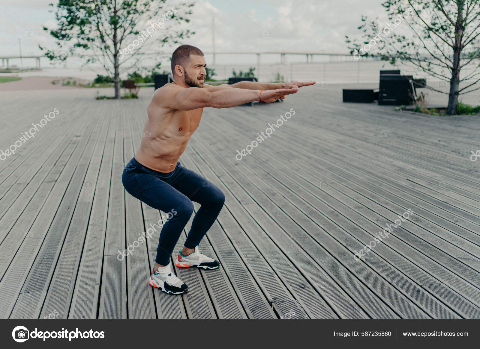 Full Length Shot Active Man Does Squatting Exercise Poses Naked Stock Photo  by ©vk_studio 587235860