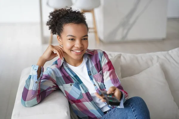 Smiling Biracial Teen Girl Sit Rest Couch Watch Home Happy — Stock Fotó