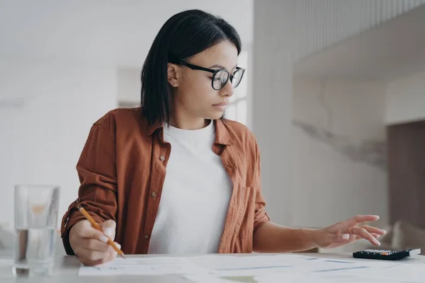 Serious Young Woman Wearing Glasses Manage Finance Budget Calculate Taxes — Fotografia de Stock