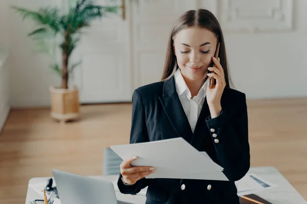 Smiling Attractive Young Businesswoman Formal Suit Talking Phone Looking Notes — Foto Stock