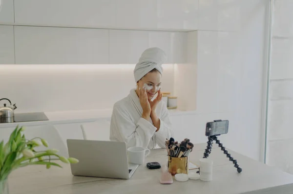 Young Attractive Woman Blogger Applying Cosmetic Patches Eyes Recording Video — Stock Photo, Image