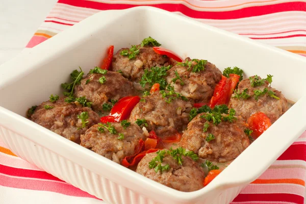 Meatballs with vegetables in white pan — Stock Photo, Image