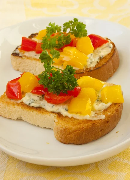 Toasts with bell pepper and cheese — Stock Photo, Image
