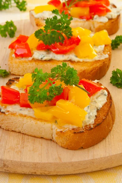 Toasts with bell pepper and cheese — Stock Photo, Image