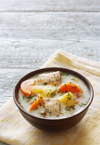 Fish soup with salmon, cream and vegetables — Stock Photo, Image