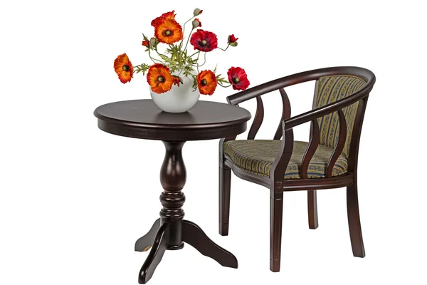 Isol ラウンド テーブルの上の花瓶に人工のケシの花束 — ストック写真