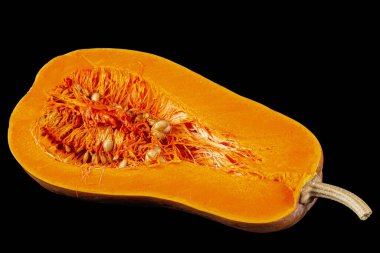 Half pumpkin, isolated on the black background